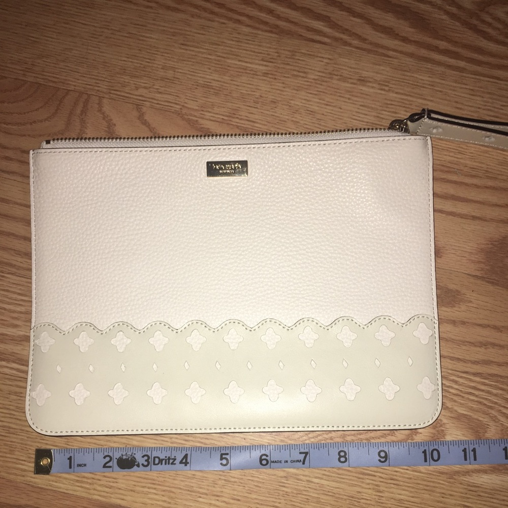 NWOT Kate Spade leather laser cut wristlet